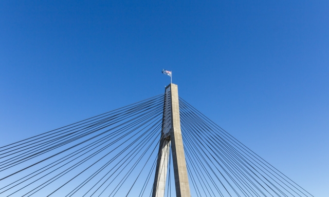 Picture of Bridge behind blue sky